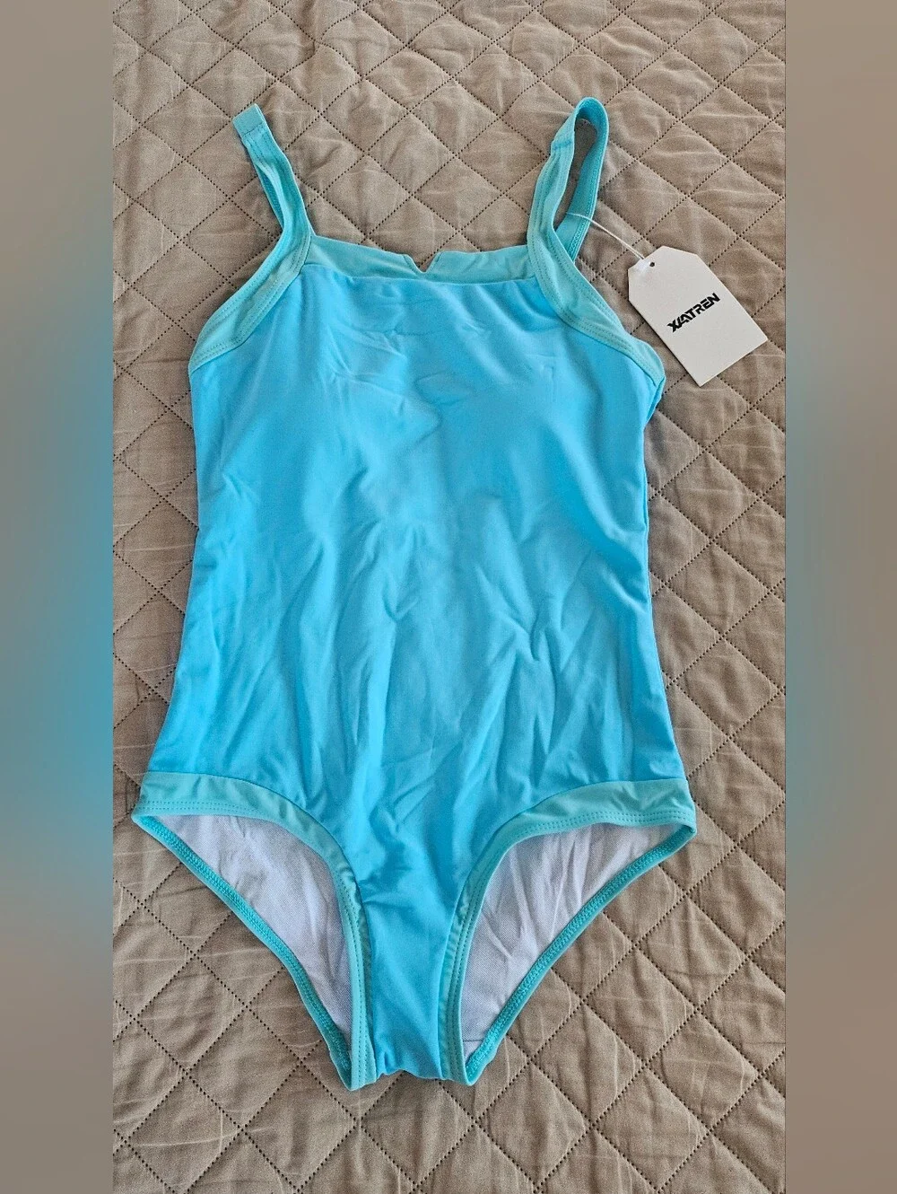 Girls size 11-12years swimsuit, bathing suit, color is blue